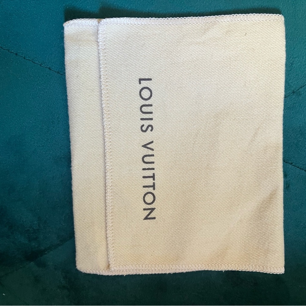 Louis Vuitton Cream Cloth with Black Logo